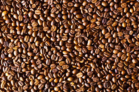 Coffee beans. Background of roasted fresh brown coffee beans. Perfect for a cool wallpaper. Banner...