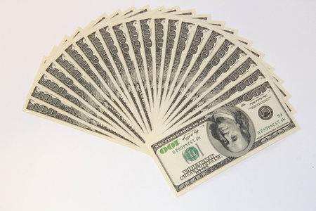Money fan. US dollar banknotes. American one hundred dollar bills. Concept of banking business and financial investment moneyの写真素材