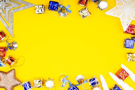 Christmas background. Copy space. New Year banner Template with gift boxes, stars, bells, toys, decorations. Bright Christmas frame. Winter holidays New Year. Top view photoの写真素材