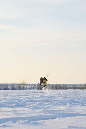 Winter sports. Ski kiting on a snowy river.の写真素材
