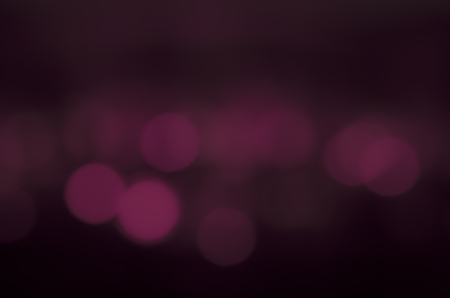 Soft colorful bokeh background. Luminous garlands of electric lights. Copy space to add text. Saturated colors. Blurry abstraction. Gentle tone. Dark night. Festive party in city. Defocus effect.の写真素材