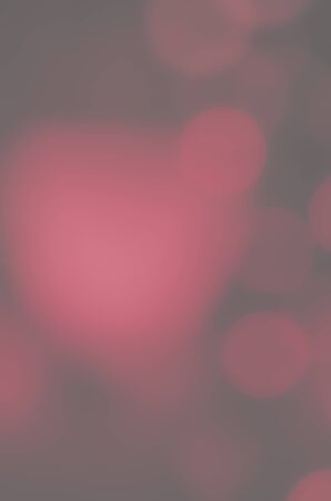 Soft colorful bokeh background. Luminous garlands of electric lights. Copy space to add text. Saturated colors. Blurry abstraction. Gentle tone. Dark night. Festive party in city. Defocus effect.の写真素材