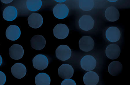 Soft colorful bokeh background. Luminous garlands of electric lights. Copy space to add text....
