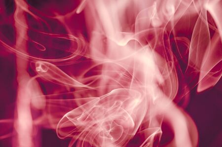 Thick, scenic clouds of smoke. From incense, or cigarettes, or cigars. Indoors. In the rays of...