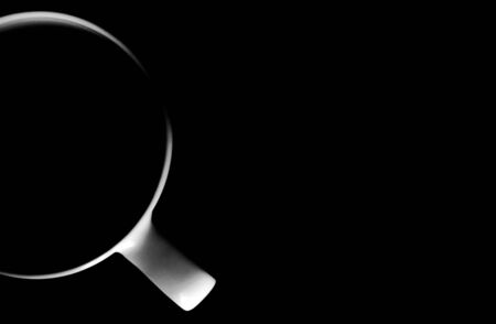 Single cup. Illuminated upper circuit. View from above. Isolated on black. Copy space to add your text.の写真素材