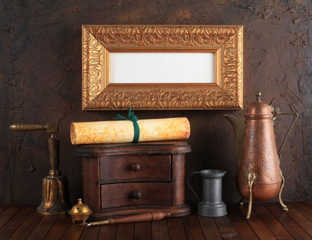 Picture gold frame with ancient subjects. Still-life.の写真素材