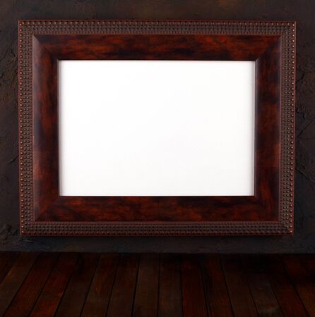 frame over the grunge wall background の写真素材