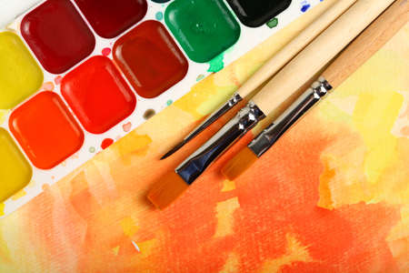 watercolor paints with brushes 