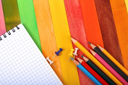 Close up of colored pencils on notebookの写真素材