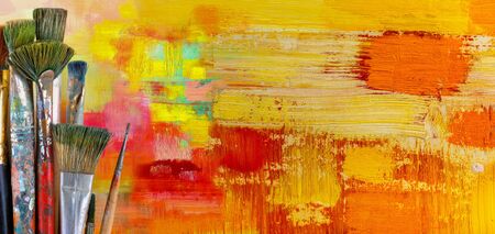 Set brushes on painted background.の写真素材