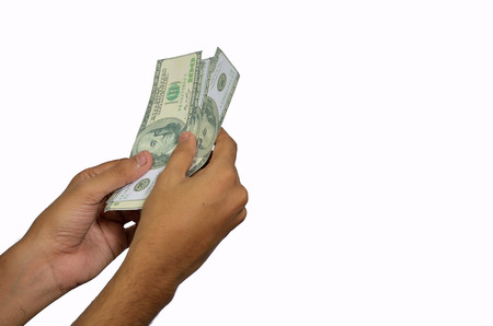 Counting money in white background