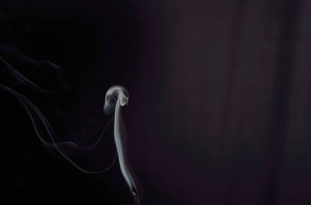 White smoke in black background.の写真素材