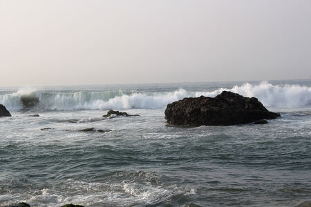 Sea water with a stoneの写真素材