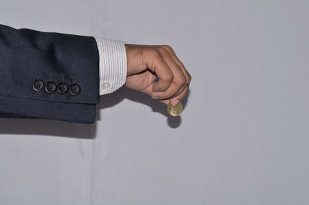 Coin and Human Handの写真素材