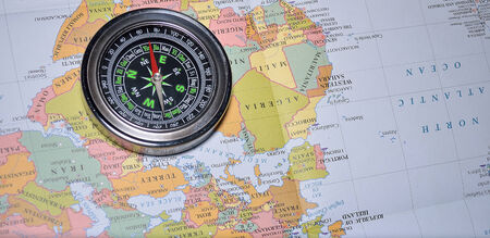 compass on map in table