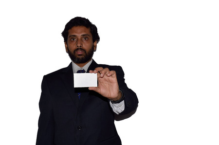 A Indian businessman displaying a blank cardの写真素材