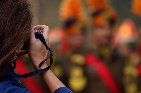 A girl captured photography.A female capture practice paredの写真素材