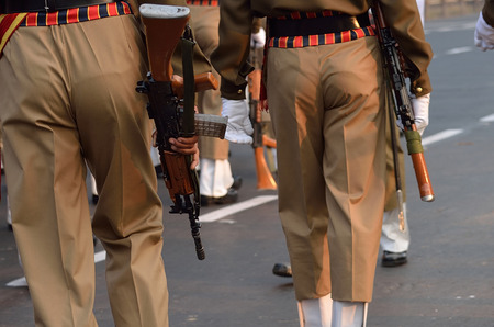 Indian army man is walking with gun at Calcutta.の写真素材