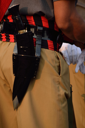 Indian army man with knife.
