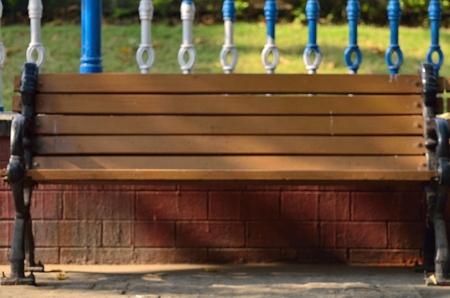 Bench with shallow depth of field.Bench in a park.の写真素材