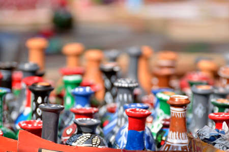 Many painted vases displayed in a fareの写真素材