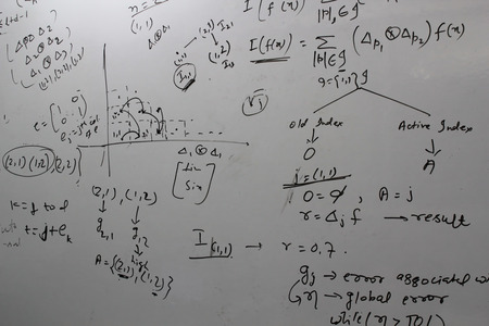 Physicist written on a white board.Science class.