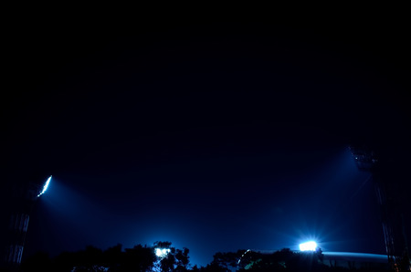 It situated at Kolkata India. Stadium floodlights against a dark night sky background. The picture is taken outside the stadium. From outside the stadium anyone can take the picture without any parmesan. I took the advantage and took the photograph.の写真素材
