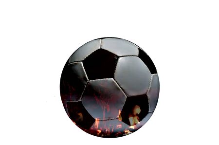 Two photograph are marge in photography software.One is soccer ball and another fire.の写真素材