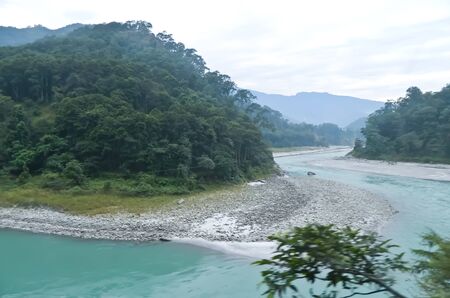 A River in rocky mountains are in India.