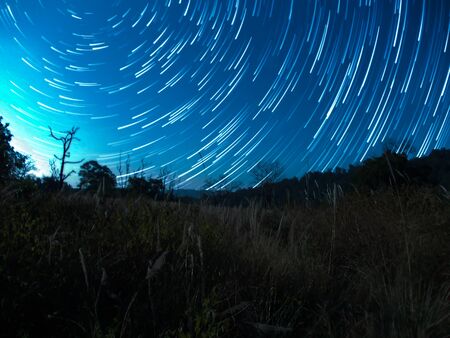 Star moving on the sky and milky way in Indian mountain.の写真素材