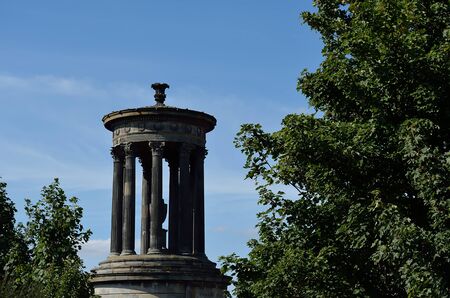 The historic city centre of Edinburgh.Historic Dugald Stewart Monument at Edinburgh, Scotland.のeditorial素材