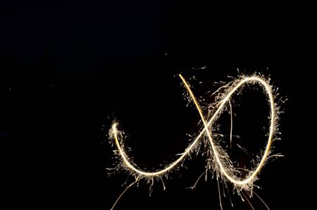 Sparkling fireworks in black background.