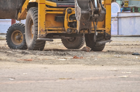 Heavy construction equipment were together by bulldozerの写真素材