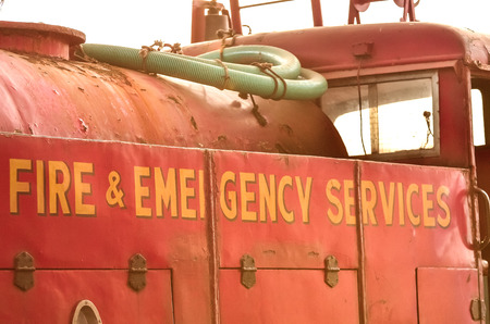 Firetruck parking. Firetruck in a white background.