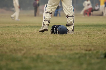 Boys are playing cricket on Maidan area at Kolkata, India. の写真素材
