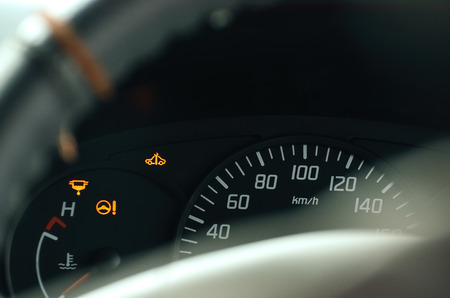 Close up on a speedometer in a car from behind.の写真素材