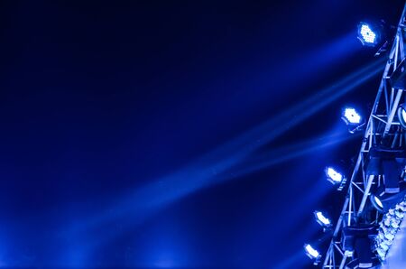 Beam of stage light for live performance on black background.
