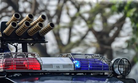 Water cannon is running in a road.の写真素材