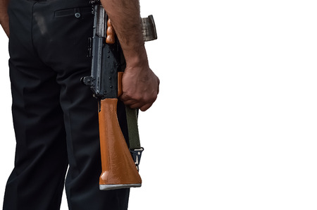Security man with gun in white background.の写真素材