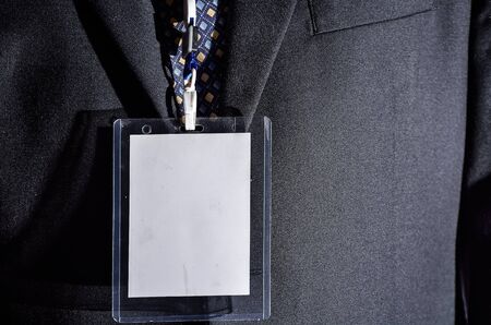 Businessman with blank ID badge