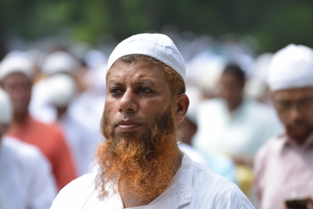 Indian Muslims are celebrating Eid in Calcutta. Their are praying to allah. Muslims on the road during the EID festival to  rad namaz in Calcutta, India.のeditorial素材