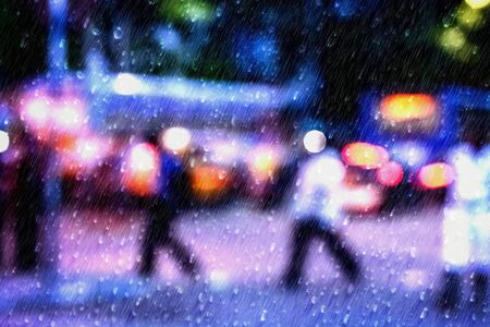City life in night in rainy season. Looking through the window glass.