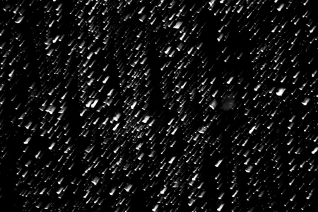 Rain drops on the window glass.