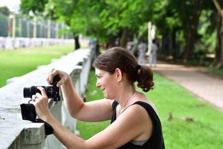 Calcutta, India - September 13, 2016: A journalist taking photograph.のeditorial素材