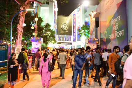Kolkata, India - November 13, 2016: During film festival men are going cinema hall. international film festival men are going to see film. Crowd in international film festivalのeditorial素材