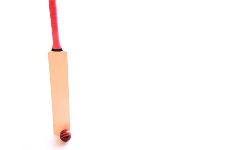Cricket bat and ball on isolated white background
