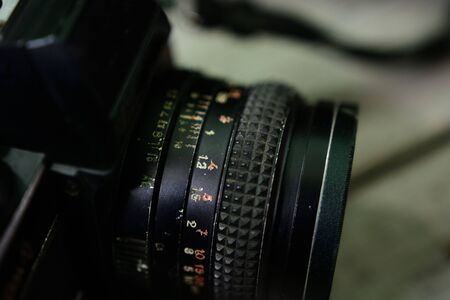 Close up of analog film camera on wooden backgroundの写真素材
