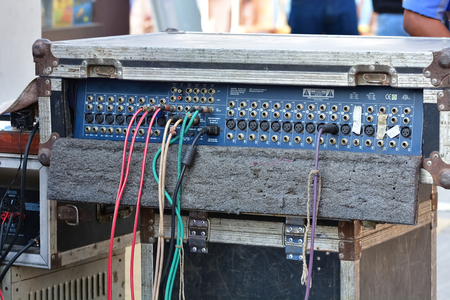 Audio mixer, music equipment in a live concert. Adjusting audio mixer