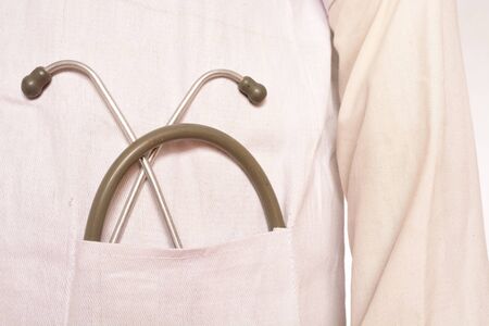 stethoscope in doctor's apronの写真素材