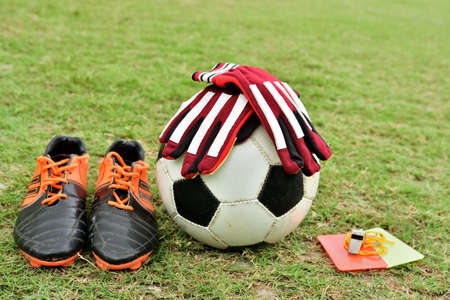 football equipment on football fieldの写真素材